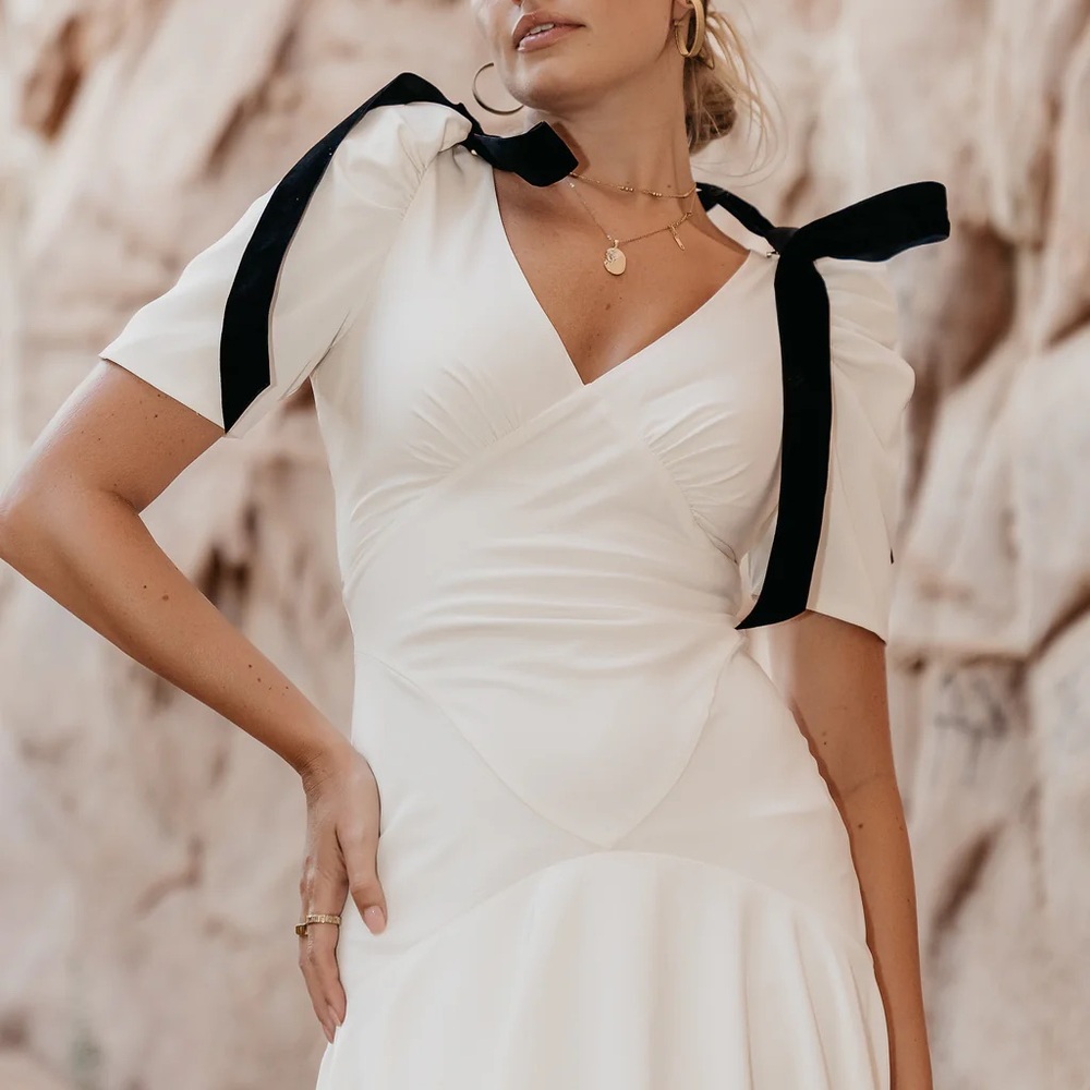 Chic White Maxi Dress with Black Bows